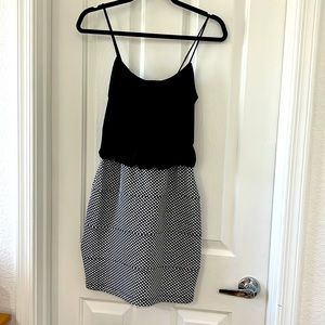 Black top pockadot bottom. Mini dress